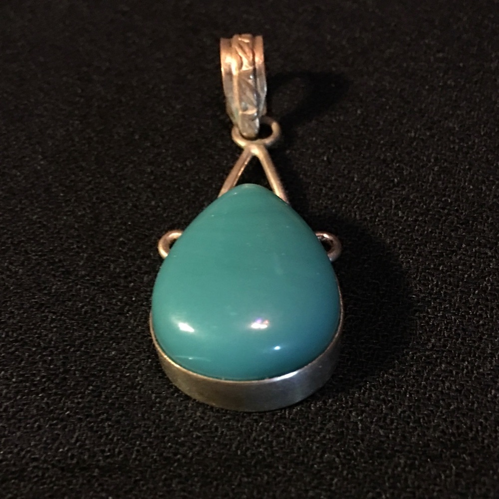Silver and blue stone pendant